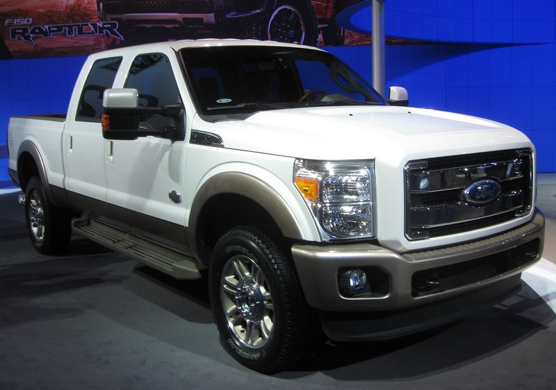 White and tan 2011 Ford F-350 Super Duty at an auto show